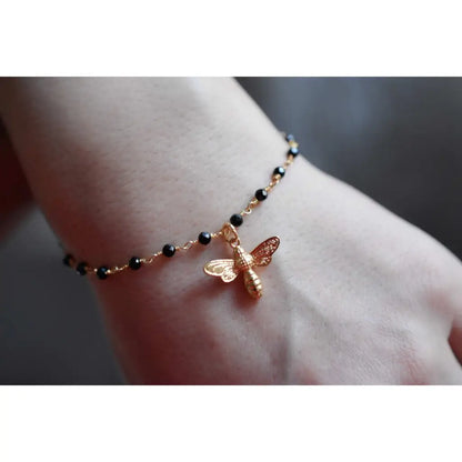 Madamlili gouden hommelarmband met onyx - edelsteenarmband
