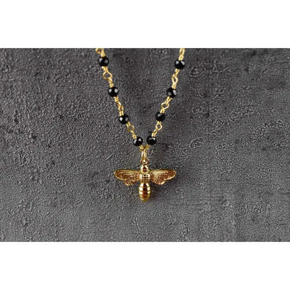 Madamlili onyx edelsteen ketting met bijenhanger goud.