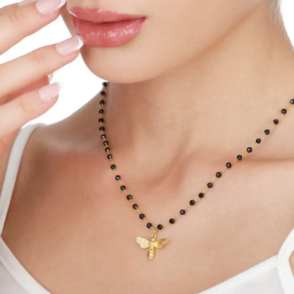 Madamlili onyx edelsteen ketting met bijenhanger goud.