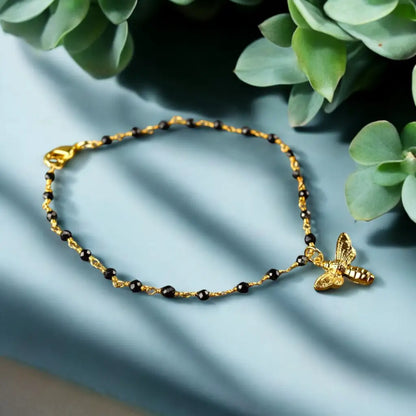 Madamlili gouden hommelarmband met onyx - edelsteenarmband