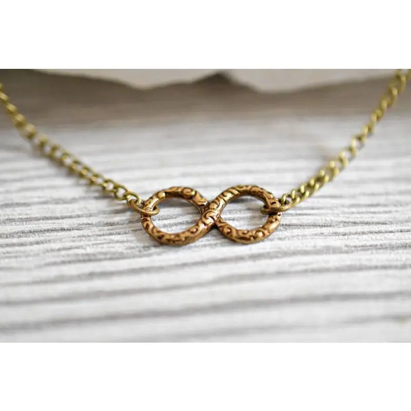 Madamlili infinity ketting - bronzen filigraan infinity.