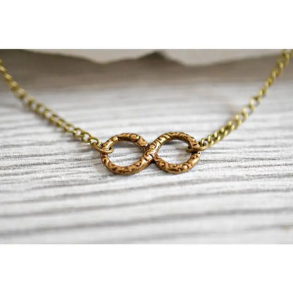 Madamlili infinity ketting - bronzen filigraan infinity.