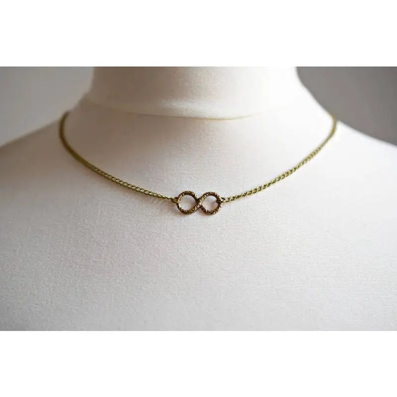 Madamlili infinity ketting - bronzen filigraan infinity.