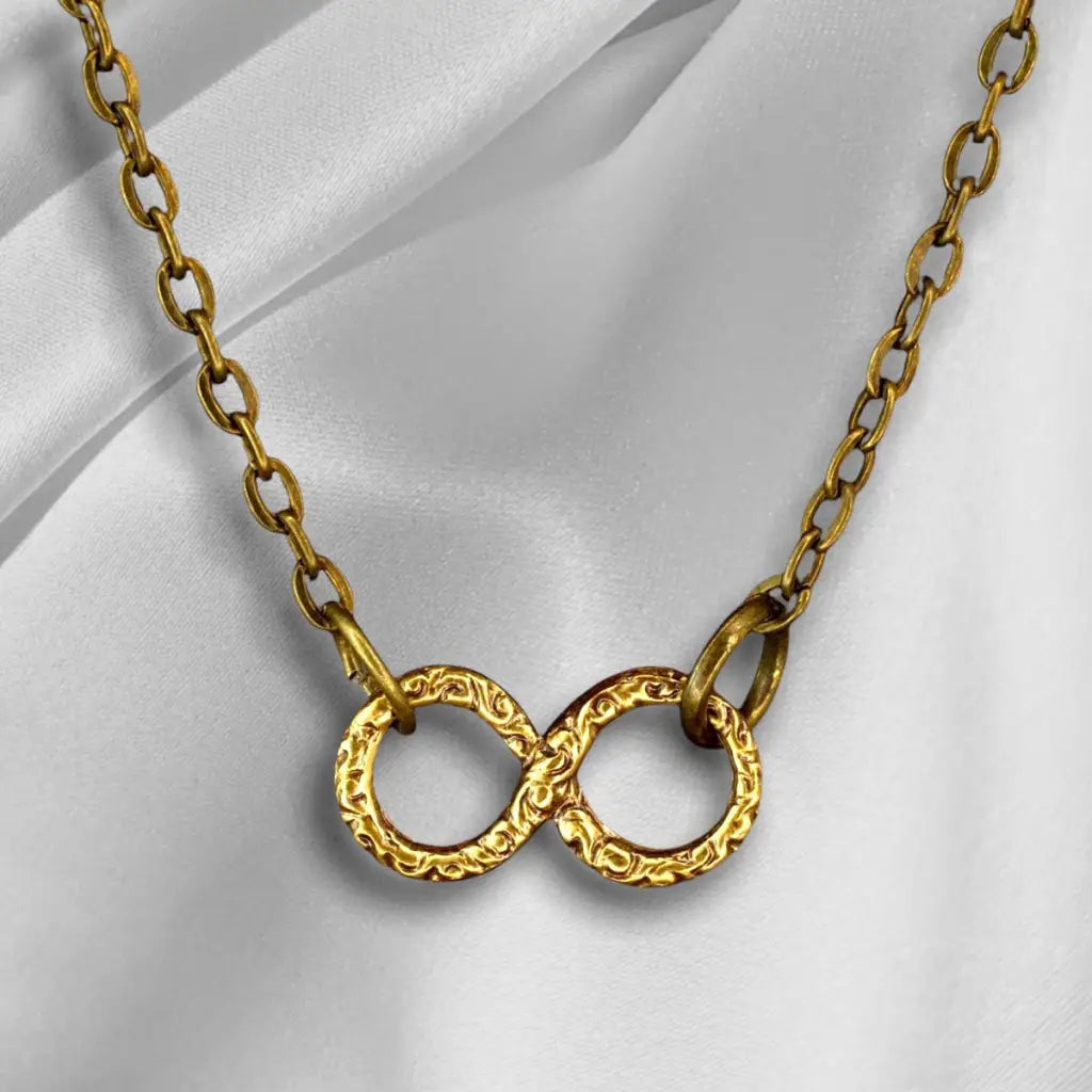 Madamlili infinity ketting - bronzen filigraan infinity.