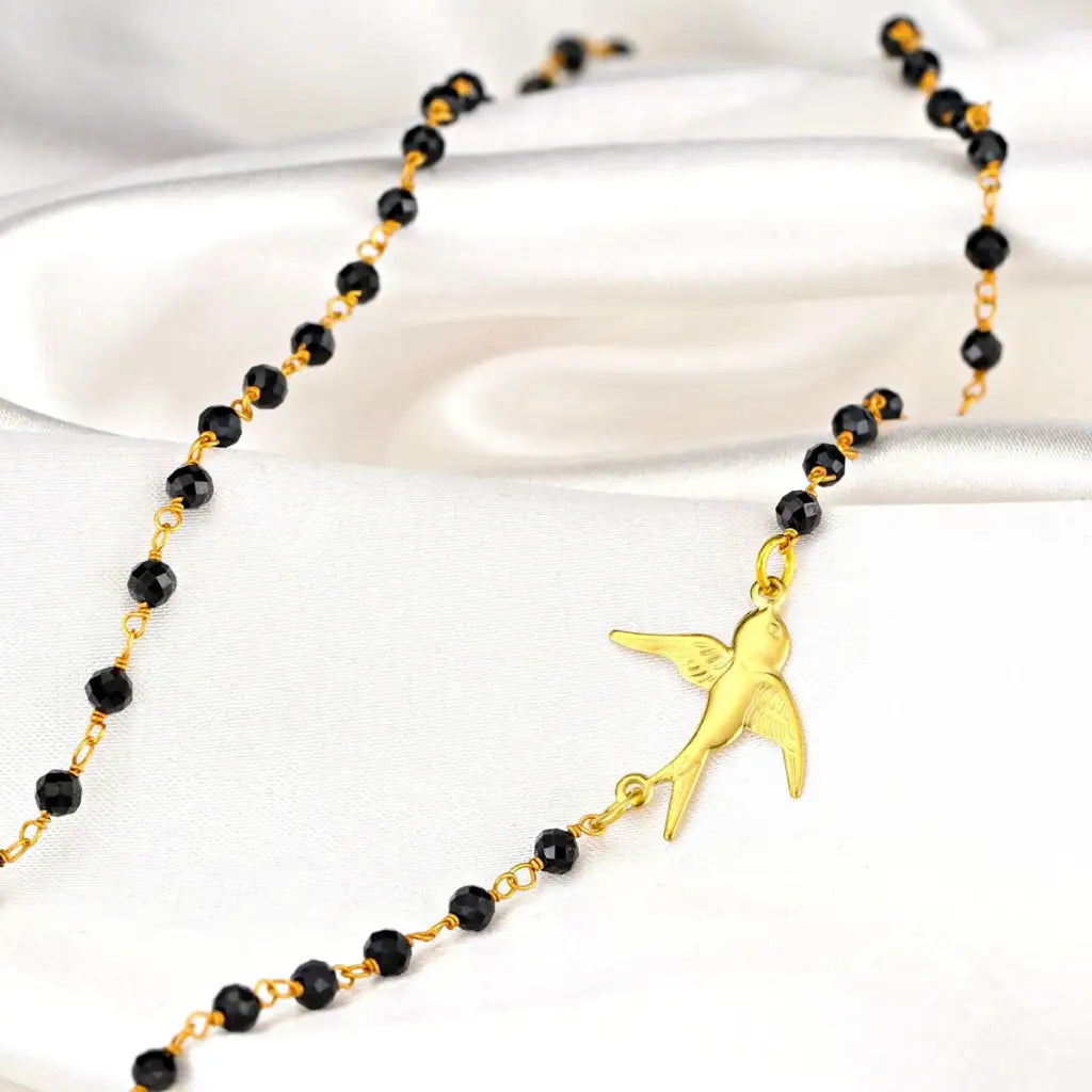 Madamlili onyx edelsteen ketting - goudzwaluw natuur