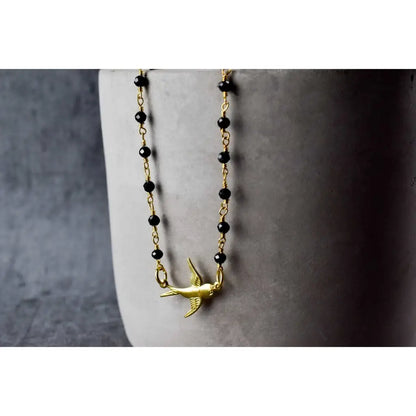 Madamlili onyx edelsteen ketting - goudzwaluw natuur