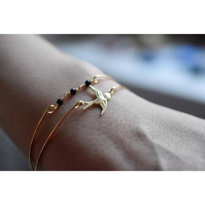 Madamlili onyx swallow gold bangle set. - sieraden