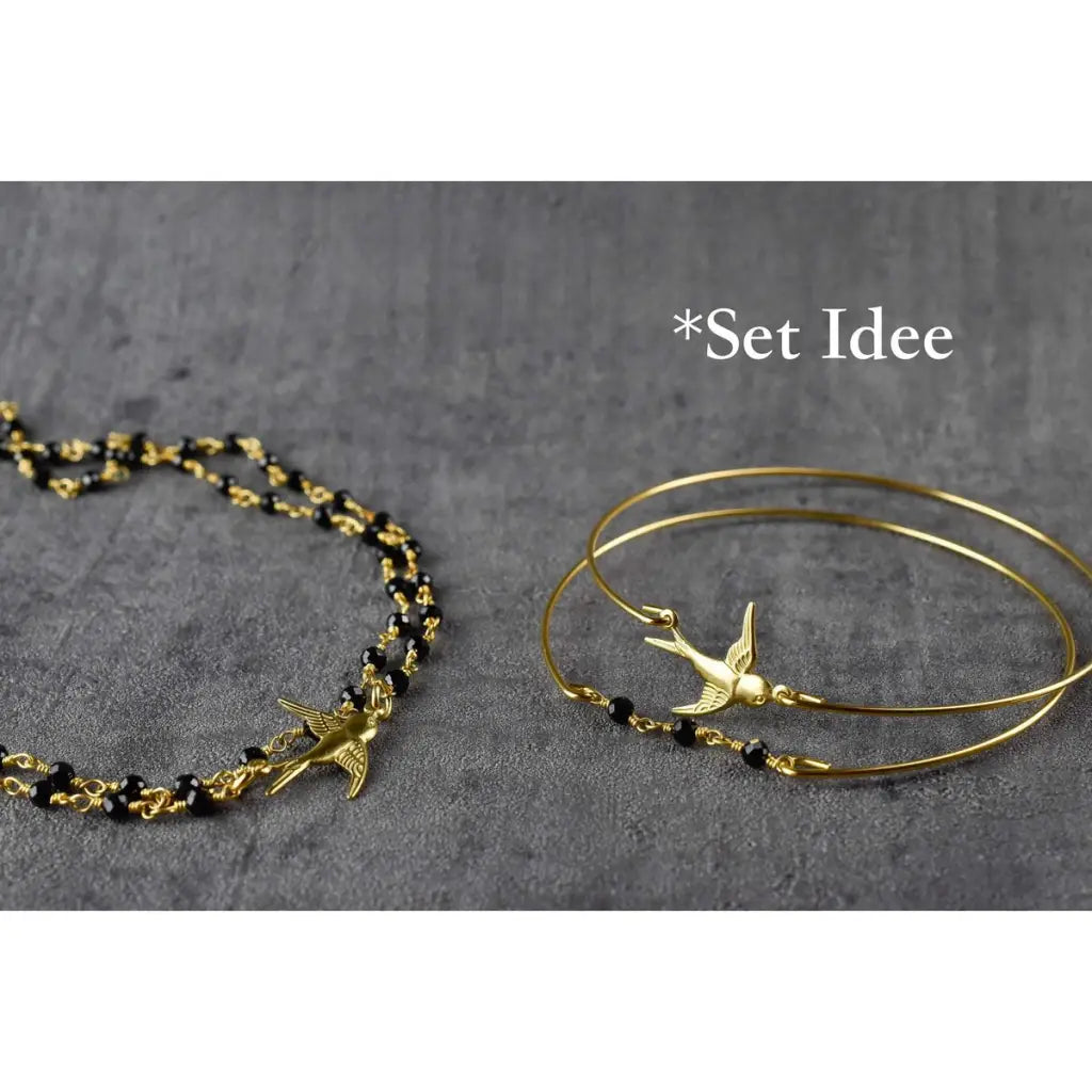 Madamlili onyx swallow gold bangle set. - sieraden
