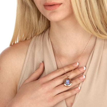 Madamlili rosé verguld vergeet-mij-niet-medaillon.