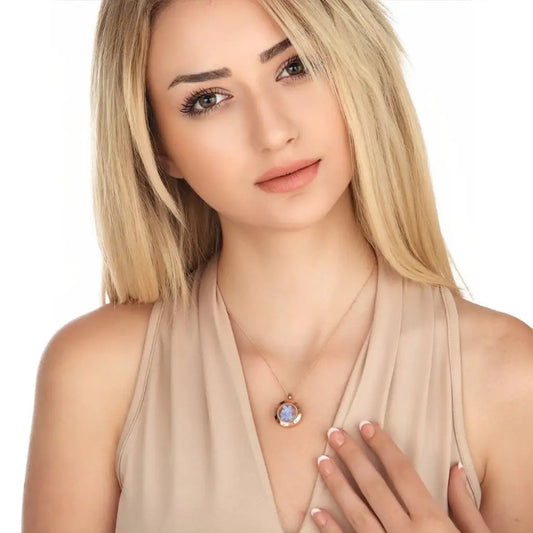 Madamlili rosé verguld vergeet-mij-niet-medaillon.