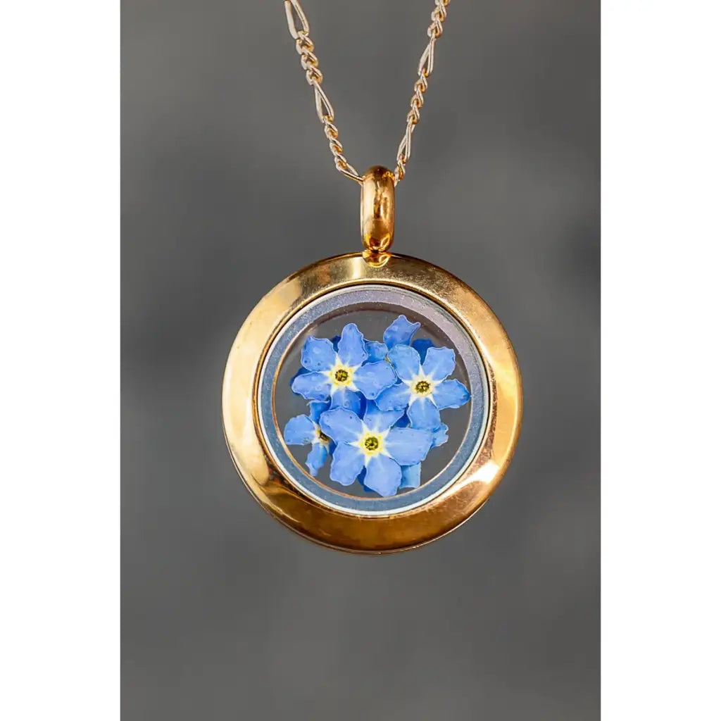 Madamlili rosé verguld vergeet-mij-niet-medaillon.