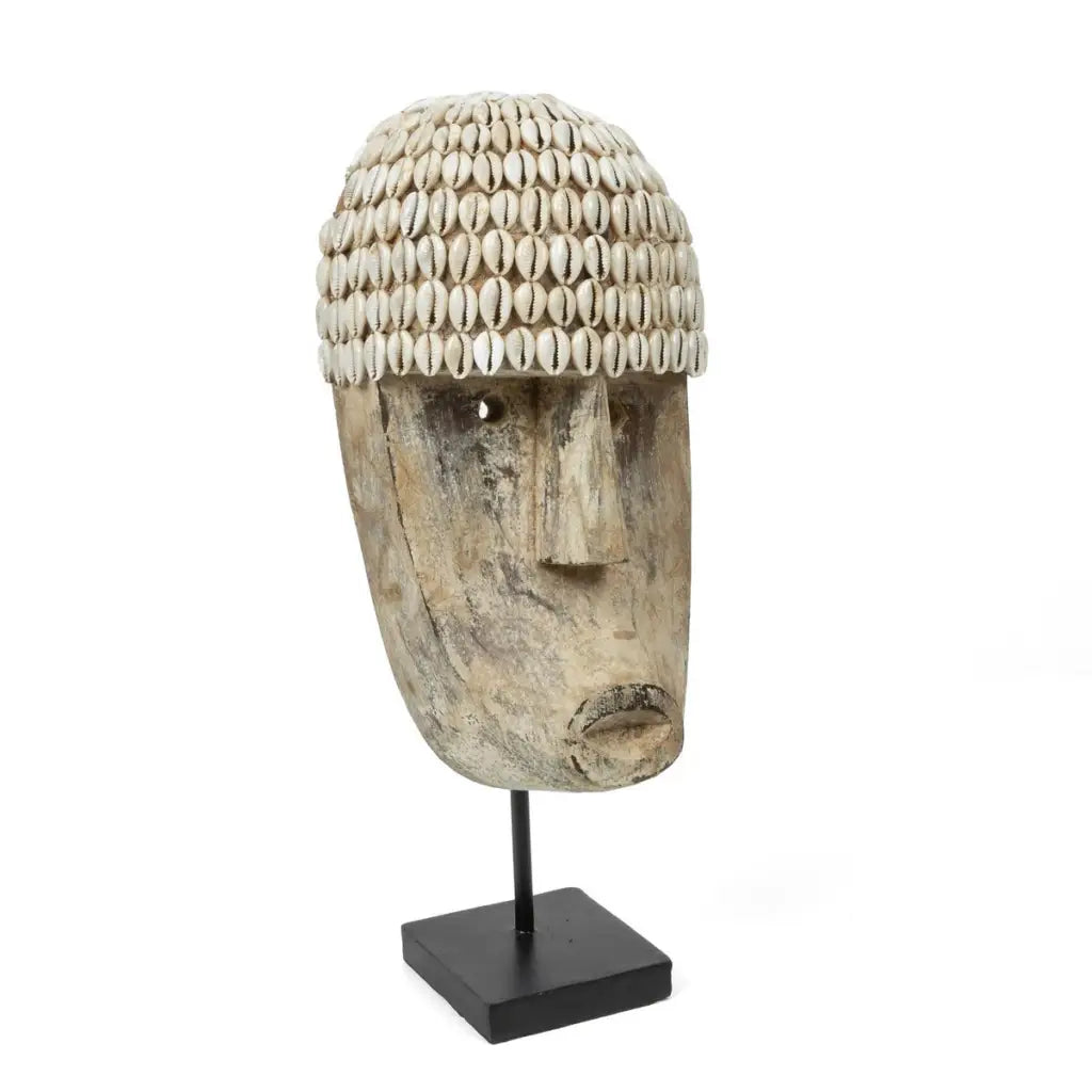 The cowrie mask on stand - medium